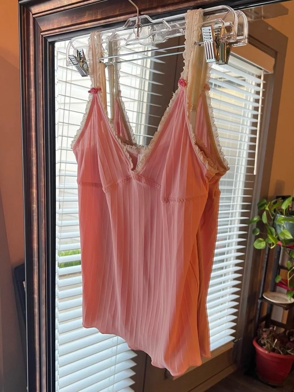 Light pink cami top with lace trim and rose appliqués, striped pattern